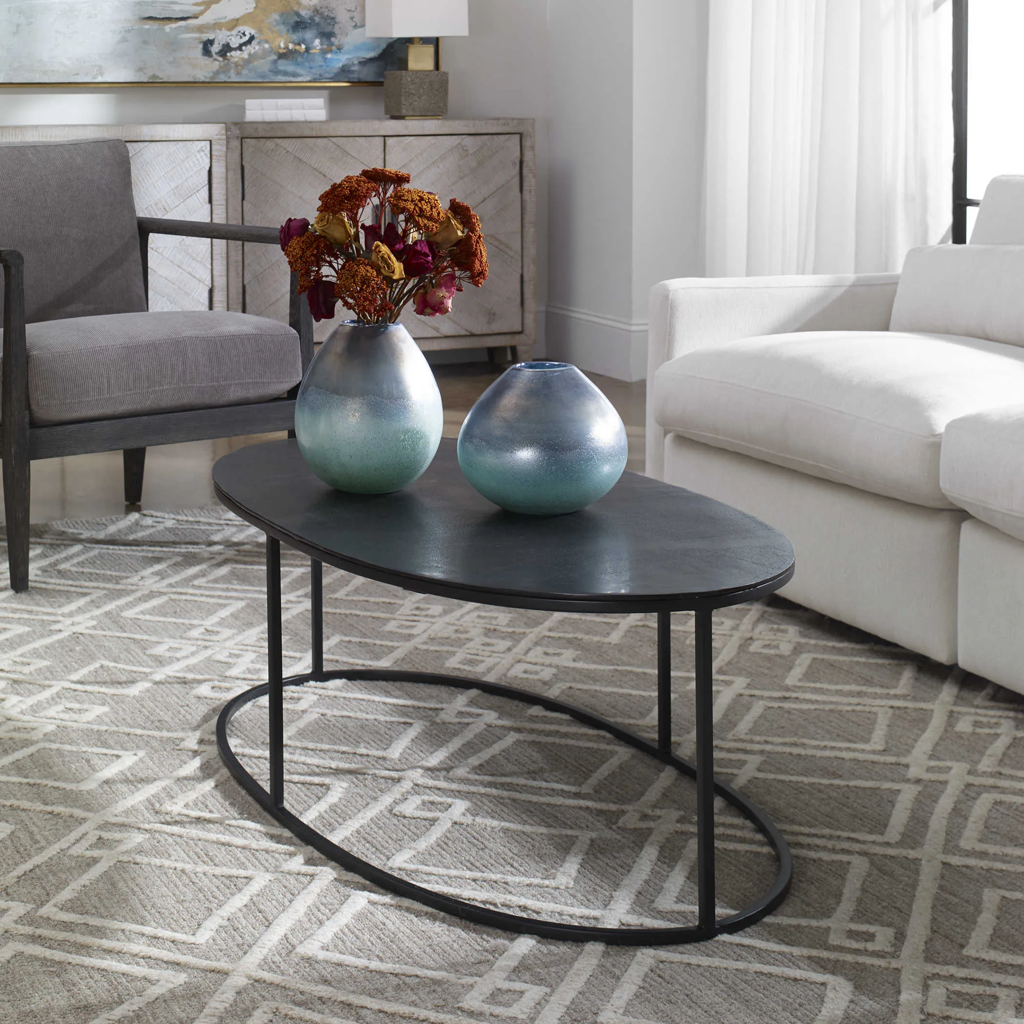 Oval iron coffee table