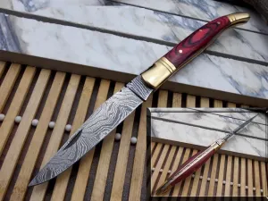 Real Damascus Steel Blade Laguiole Folding Knife Replica, 8.5" Long with 4" Hand Forged Custom Twist Pattern Blade. Red Dollar Wood & Brass Bolster Scale. Cow Hide Leather Sheath Included