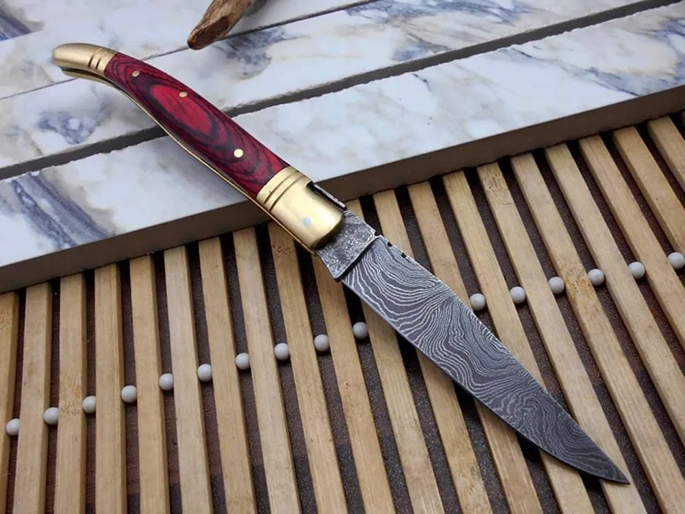 Real Damascus Steel Blade Laguiole Folding Knife Replica, 8.5" Long with 4" Hand Forged Custom Twist Pattern Blade. Red Dollar Wood & Brass Bolster Scale. Cow Hide Leather Sheath Included